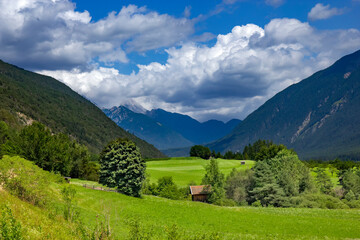 Fototapeta na wymiar View of the green valley in Tyrol, Austria