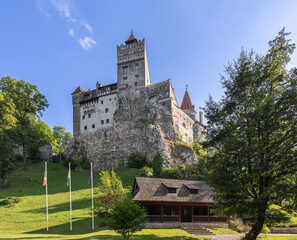Fototapeta na wymiar Castle Dracula, Bran Castle is one of Romania’s top tourist attractions perfectly integrated into the surrounding landscape , Brasov, Romania