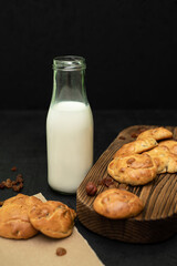 Homemade biscuits with milk. Biscuits with raisins and nuts.