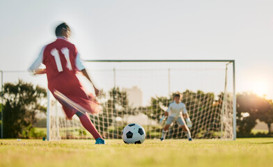 Soccer, goal post and ball, soccer player running and kicking to score goals, motivation on grass soccer field. Sports, health and fitness exercise training for football game in summer competition. © L Ismail/peopleimages.com