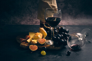 still life wine different cheeses and fruits