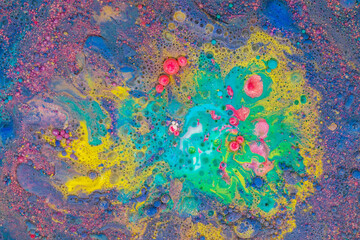Fototapeta na wymiar Multicolored paints create a beautiful abstract background