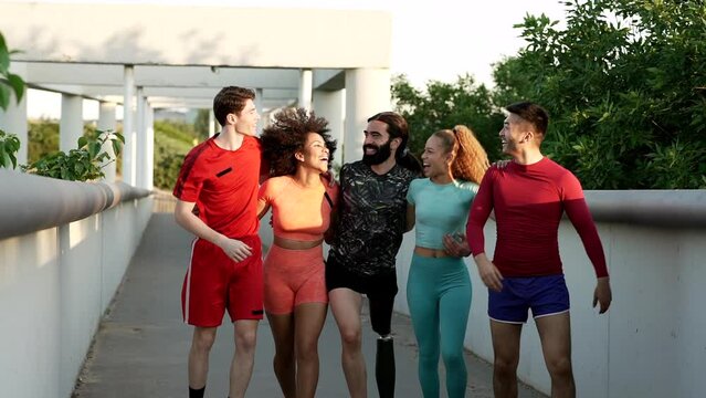 group of multiracial sporty friends happy as they start their training outdoors.