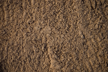 River sand. Blank textured surface. Background with space to copy. Building material..