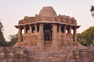 Fototapeta na wymiar The Sun Temple of Modhera is a Hindu temple dedicated to the solar deity Surya located at Modhera village of Mehsana district, Gujarat, India