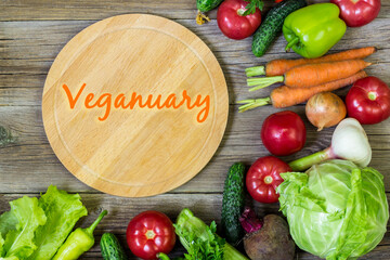 Flat lay with many raw vegetables. Vegetarian and vegan diet month in january called Veganuary.