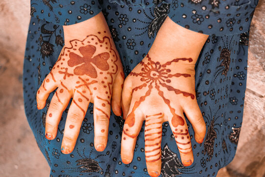 An Afghan Girl Wearing A Henna Design