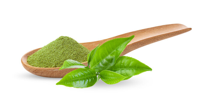 Instant matcha green tea in wood spoon and tea leaves on transparent png