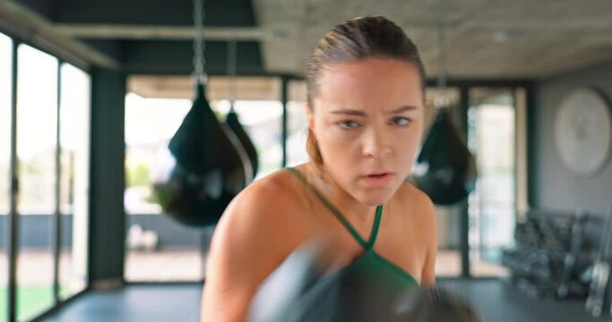 Boxing pov, fitness and sport with woman, workout and boxing gloves for mma fight, fitness and empower in gym. Fit boxer female and champion attitude for self defense, training and power exercise