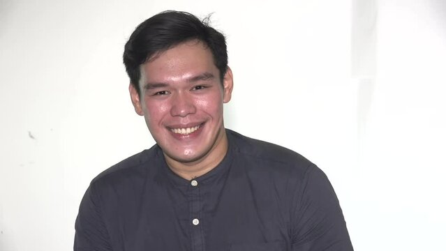 A Smiling Adult Filipino Man Isolated
