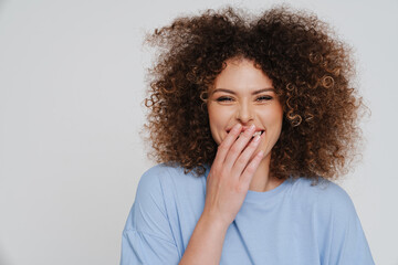 Portrait of young beautiful attractive smiling happy curly woman