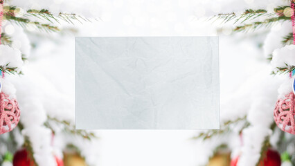 Unfocused background for winter holidays with blank paper for text