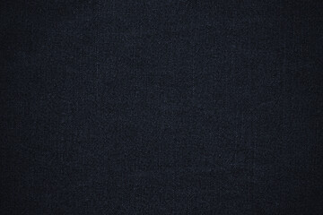 texture of black colored jeans denim fabric background	
