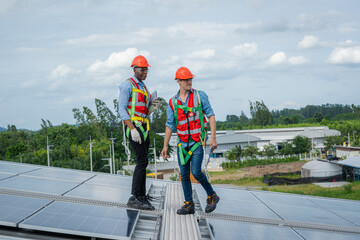 Solar PV Rooftop,Engineer and workers installation solar cell on the roof of factory industry.