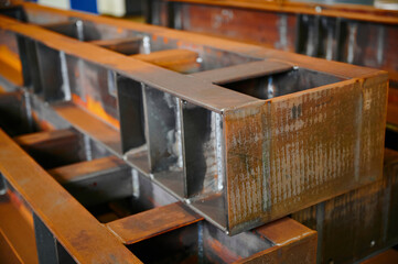 Welded fabrication made of beams stacked in plant warehouse