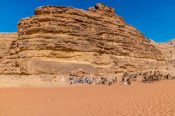 A view across a rock wall face in the desert landscape in Wadi Rum, Jordan in summertime