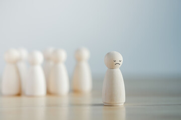 Unhappy face stand alone from many people. Sadly, insular, lonely. Emotion, Mental health...