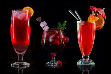 Set of coctails on bar counter in a restaurant, pub. Collection of fresh juice alcoholic drinks. Cooler beverage isolated on black background