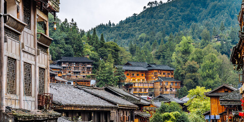 Fototapeta premium High angle closeup of buildings in Qianhu Miao Village in Xijiang, Guizhou, China