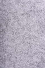 Full frame in short pile gray felt, vertical arrangement.