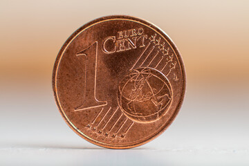 1 euro cent super macro stands on the edge