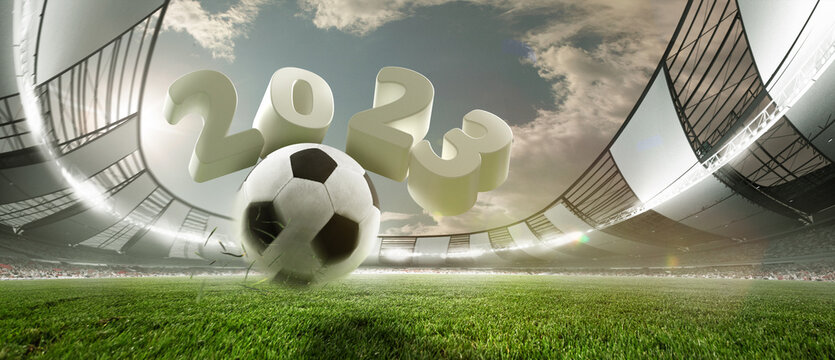 Soccer football ball jumping on green grass of football field at crowded stadium with spotlight. Concept of sport, art, energy, power. Creative collage. 2023