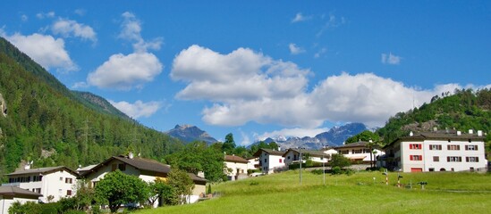 Fototapeta na wymiar Beautiful town in Brusio among the alpine ranges in Switzerland