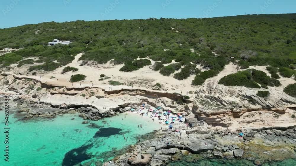 Sticker Aerial shot of Formentera, Ibiza, Spain, with people on the beach and yachts in the water