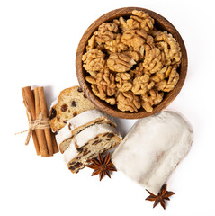 Stollen. christmas cake isolated on white background.Stollen with raisins and nuts. Dessert.