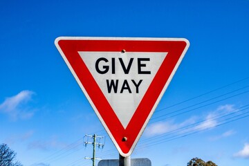 Shot of traffic sign saying give way in Emmaville in Australia