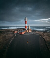 Vertical shot of a lighthouse on a gloomy day in Canary Islands