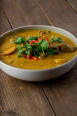 Closeup shot of a yellow cream soup