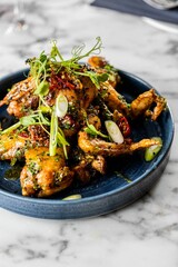 Vertical shot of a roasted chicken
