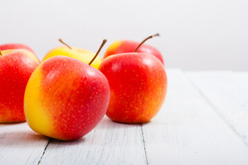 apple fruits on old white wooden table