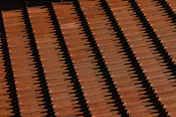 brown ceramic roof tiles close up