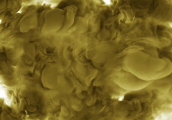 Smoke like shot of yellow ink in water for cool background