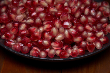Pomegranate, ripe and juicy fruit with a set of vitamins