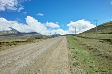 Fototapeta na wymiar Empty long road in the countryside