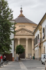 Fototapeta na wymiar Exterior main facade view at the Church of Santa Victoria of Córdoba, or Iglesia del Colegio de Santa Victoria, an iconic spanish neoclassical building, Córdoba city