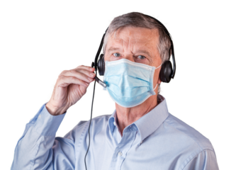 Senior man with face mask using headset to communicate with team or customers