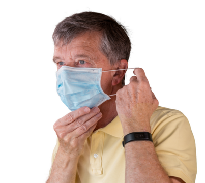 Senior man adjusting face mask and looking very worried about the epidemic