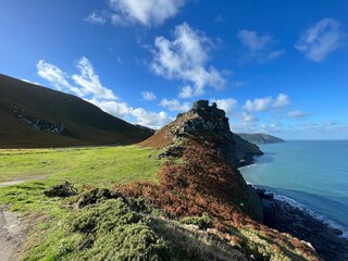View of the waterside slopes under he blue sky in Lynton and Lynmouth