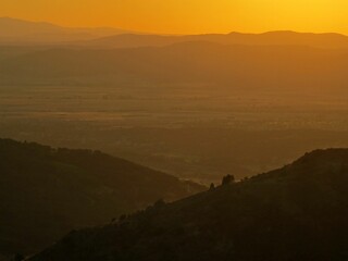 Scenic orange sunset in the mountains of Avila