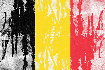 Belgium flag painted on old distressed concrete wall background