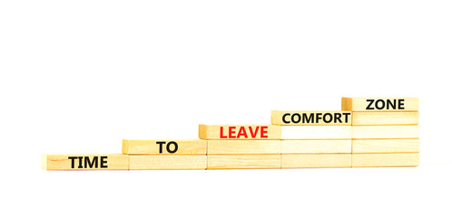 Leave comfort zone symbol. Concept words Time to leave comfort zone on wooden blocks. Beautiful white table white background. Business time to leave comfort zone concept. Copy space.
