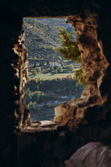 Entrevaux, France - 30.10.2022 : View of the mountains and the medieval town of Entrevaux from the citadel on the rock