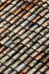 Ancient tiles covering the roof of the citadel in Entrevaux, south of France