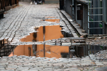 Cobblestone - old street in Riga. A view just after rain.