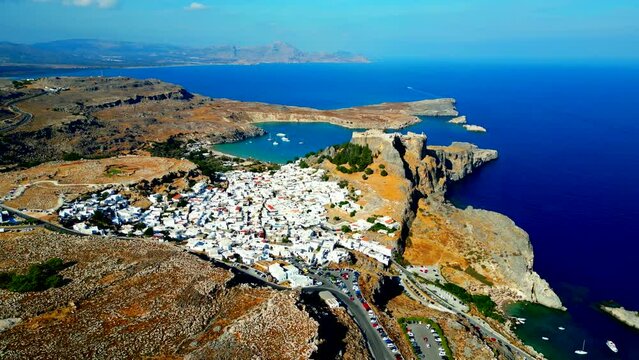 Lindos is a town on the Greek island of Rhodes. It&rsquo;s known for its clifftop acropolis, which features monumental 4th-century gates and reliefs from about 280 B.C.