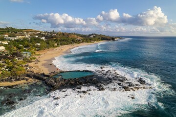 Fototapeta premium Aerial view of Boucan-Canot beach in the west of Reunion Island on a sunny day